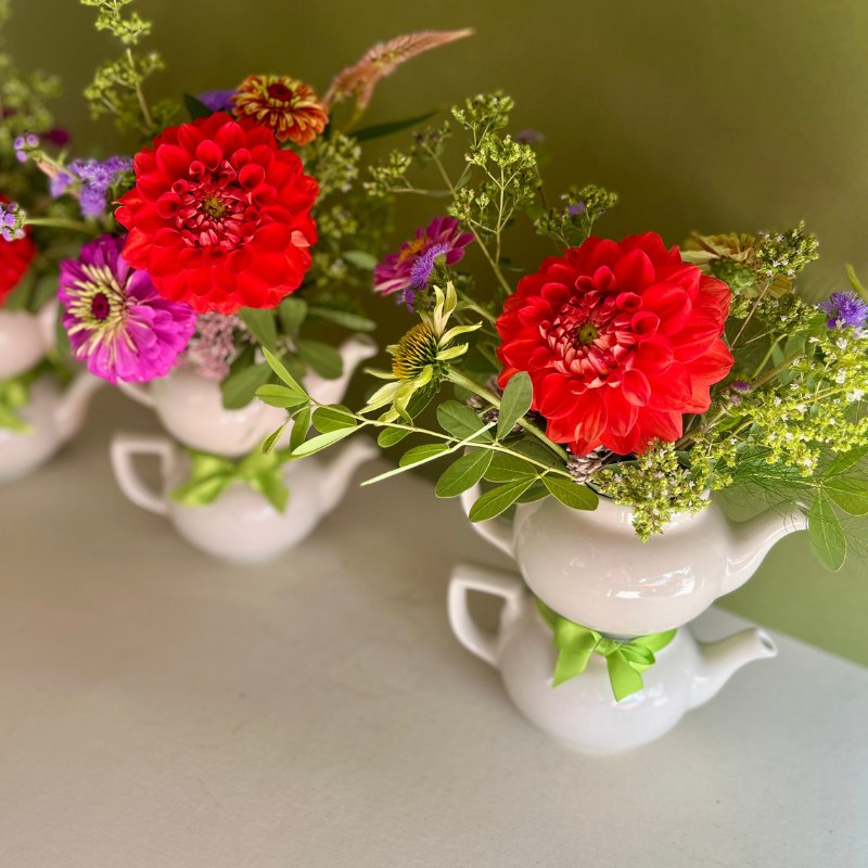 Bridal show tea pot centerpieces arranged for delivery